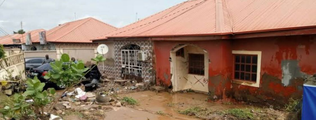 Man Driving in His Car Swept Away by Flood in Abuja Estate 1